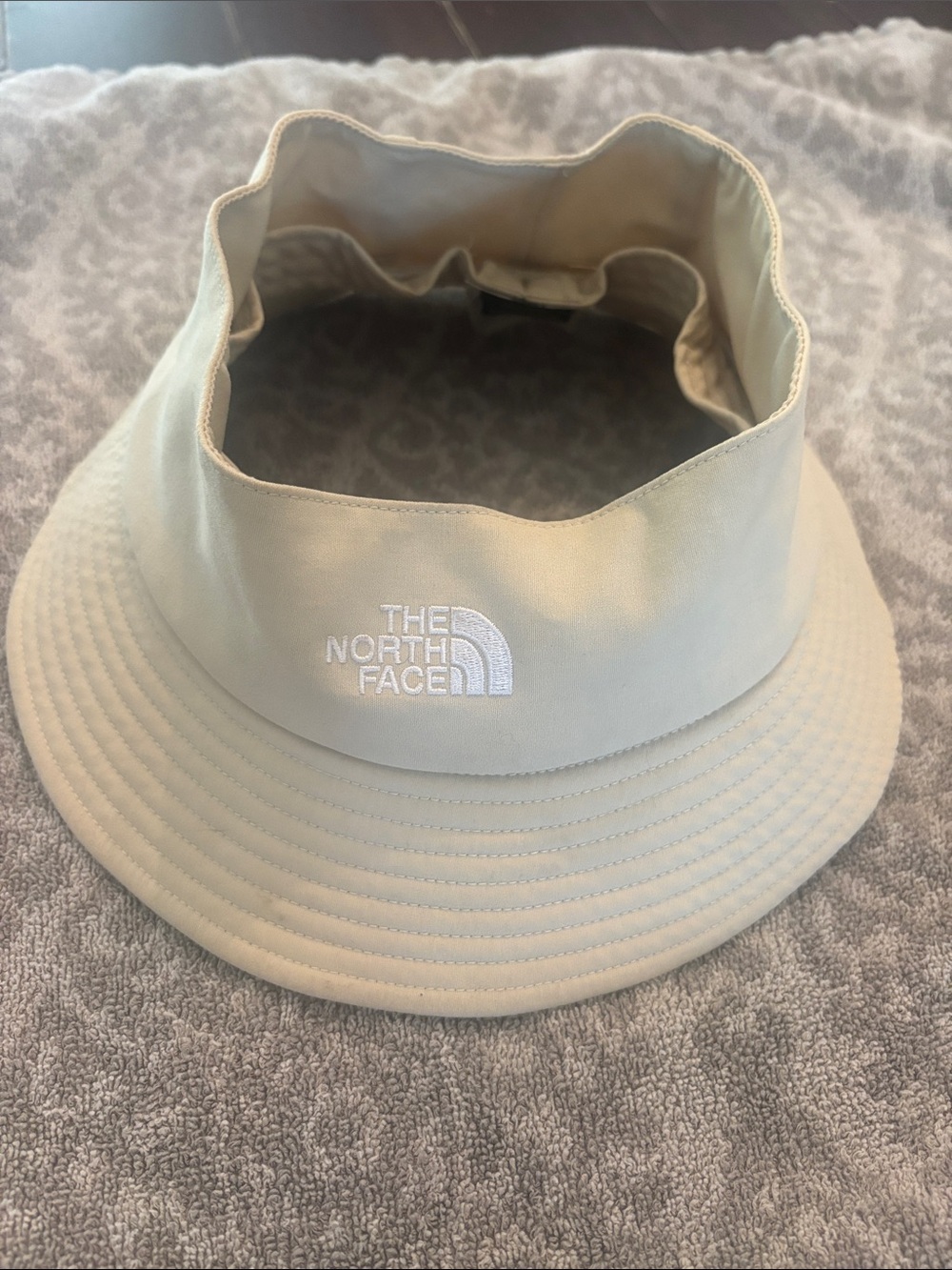 The North Face Light Beige Bucket Hat with Embroidered Logo